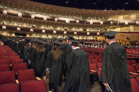 Commencement - Recessional, graduates file out of the BYU-Idaho Center.  Dec 2017