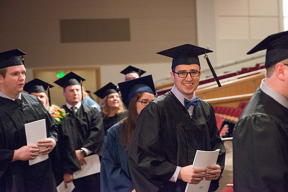 Commencement - Recessional, graduates file out of the BYU-Idaho Center.  Dec 2017