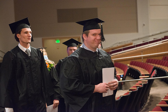 Commencement - Recessional, graduates file out of the BYU-Idaho Center.  Dec 2017