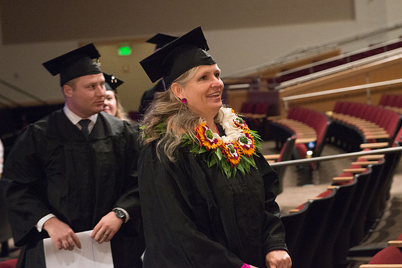 Commencement - Recessional, graduates file out of the BYU-Idaho Center.  Dec 2017