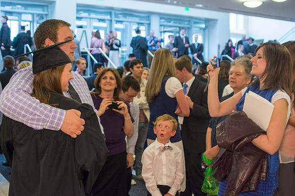 Brigham Young University-Idaho Graduates tour campus with their families saying goobyes to peers and getting pictures with friends and family before the convocation ceremonies. Photo by Ryan Chase