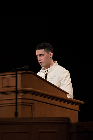 Student praying during the welcoming to new students and parents from President and Sister Eyring. Jan 2018