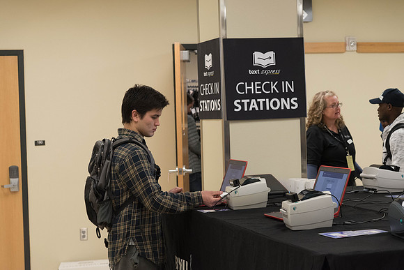 Students pick up their books at the start of the Winter 2018 Semester.