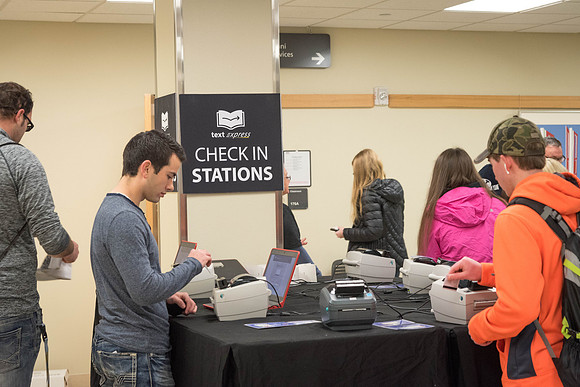 Students pick up their books at the start of the Winter 2018 Semester.