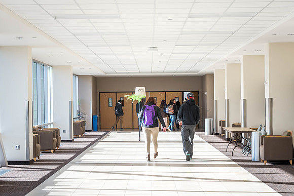 A look down the sunlit hallway leading into the I-Center.
