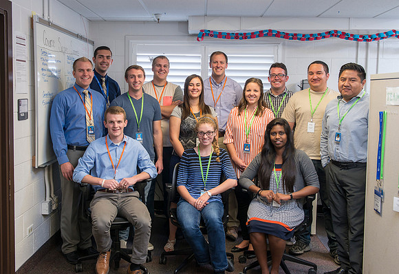 Student employees working together in Course Improvement.