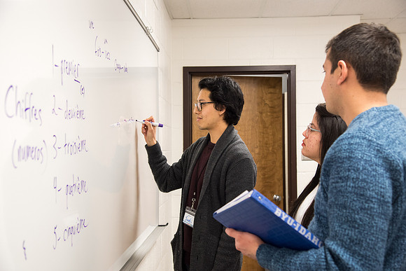 Students practice French at the Conversation Lab.