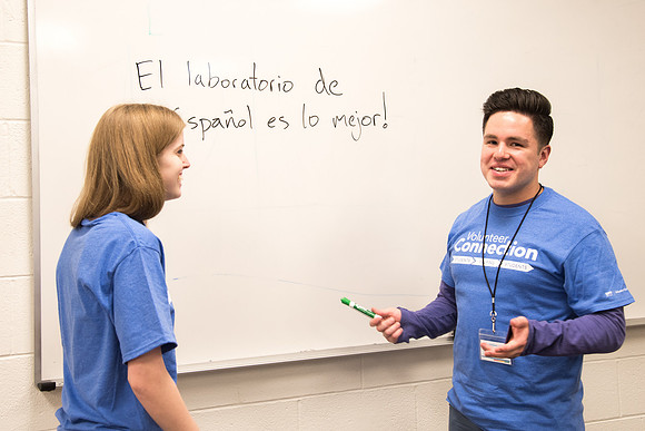 Student practices Spanish at the Conversation Lab.