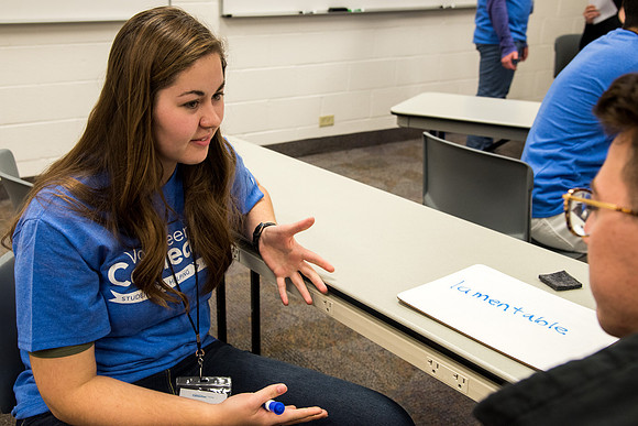 Student practices Spanish at the Conversation Lab.