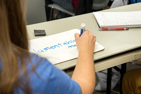 Student practices Spanish at the Conversation Lab.