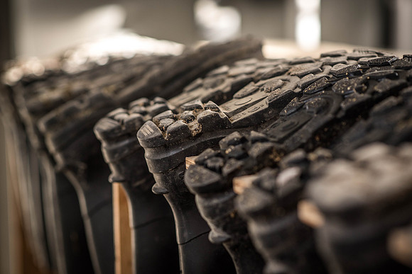 A row of boots in the Hog building.
