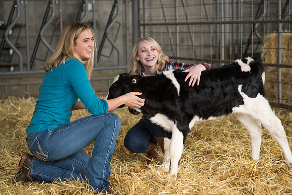Brittin Braithwaite and Erica Crabb make a friend.