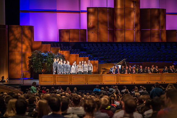 A student choir performs before Devotional.