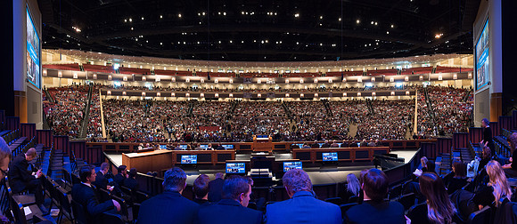 Students gather in the BYU-Idaho Center Auditorium for a devotional with an apostle, Elder Gary E Stevenson.