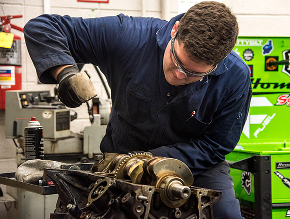 Students at the Internal Combustion Engine class that is taught by Brother Justin Miller.
