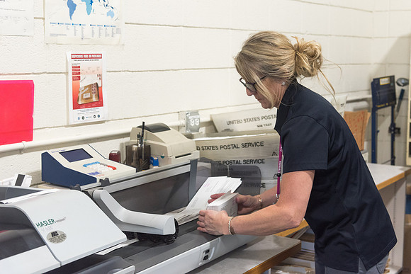 Jodee Boots, Mail Services Assistant, works in the mail room.