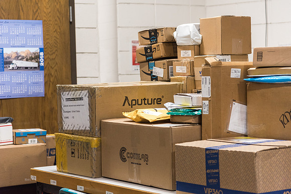 Students work in Mail Services getting packages organized and sent off to Centre Square apartments.
