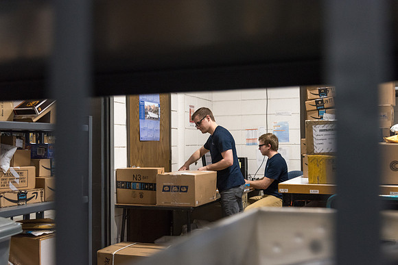 Students work in Mail Services getting packages organized and sent off to Centre Square apartments.