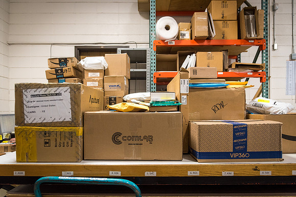 Students work in Mail Services getting packages organized and sent off to Centre Square apartments.