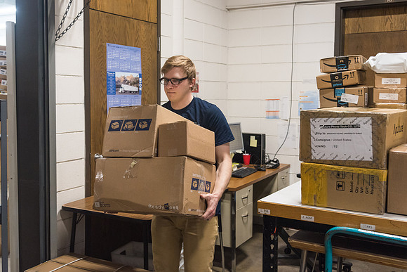 Students work in Mail Services getting packages organized and sent off to Centre Square apartments.