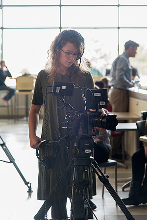 University Relation employees filming the conversation.