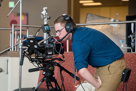 University Relation employees filming the conversation.