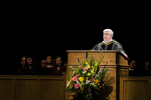Elder Teixeria of the Europe Area Presidency address graduates during the Convocation of the College of Business and Communication in the Hart Auditorium.