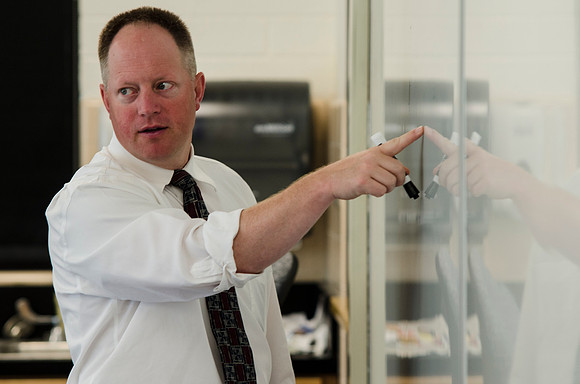 Brian Pyper teaches principles of Wave Physics to his class