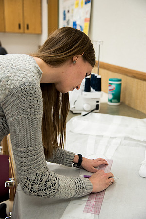 Students making Bridal dress pattern in FCS 490R taught by Sister Genet Orme.