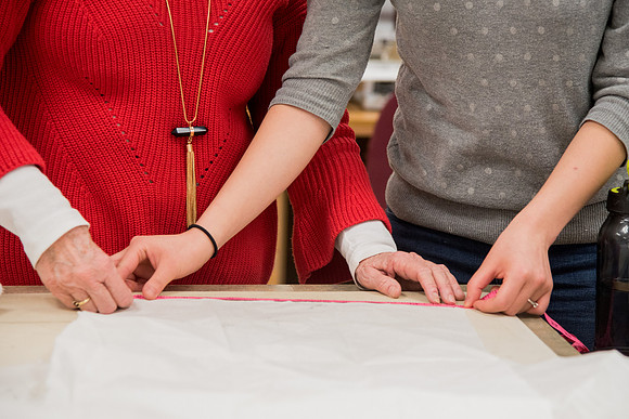 Students making Bridal dress pattern in FCS 490R taught by Sister Genet Orme.