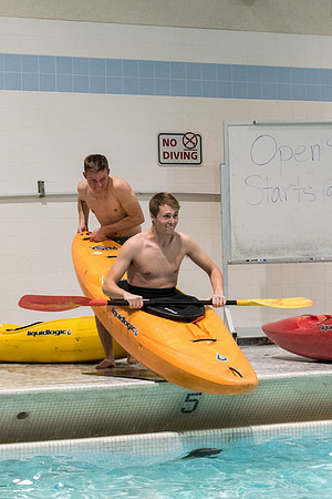 Students for a weekly gathering in the Hart pool to practice kayaking.