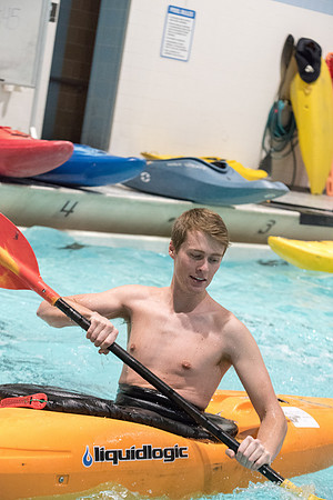 Students for a weekly gathering in the Hart pool to practice kayaking.
