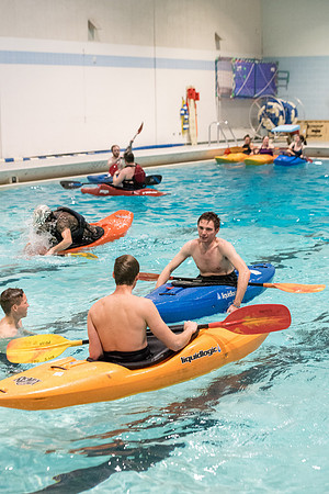 Students for a weekly gathering in the Hart pool to practice kayaking.