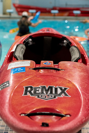 Students for a weekly gathering in the Hart pool to practice kayaking.