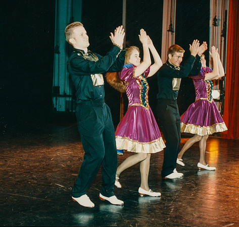 Folk dancers perform.