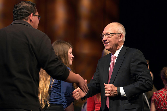 Emeritus General Authority of the Seventy greets students after the BYU-Idaho devotional.