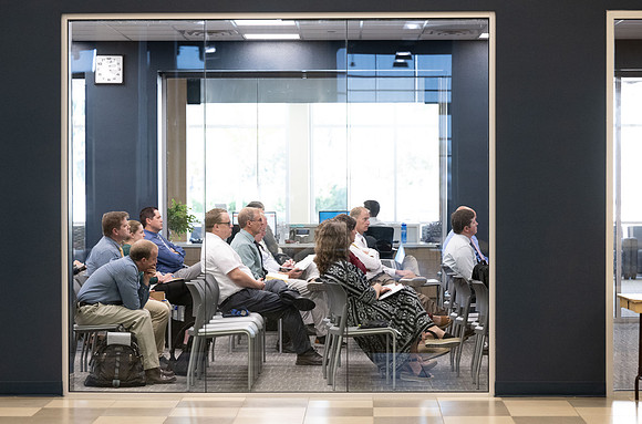 Faculty gather together for a Conference before the start of the Fall semester.