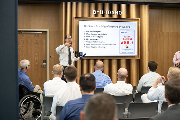 Faculty gather together for a Conference before the start of the Fall semester.