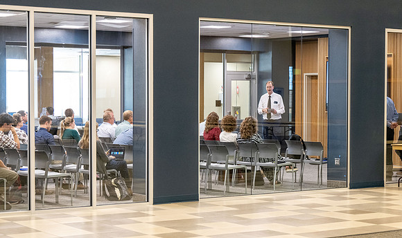 Faculty gather together for a Conference before the start of the Fall semester.