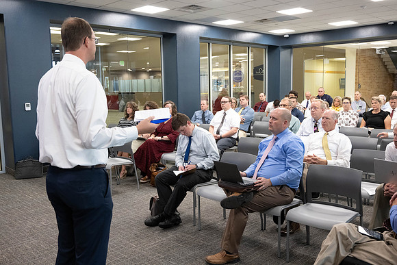Faculty gather together for a Conference before the start of the Fall semester.