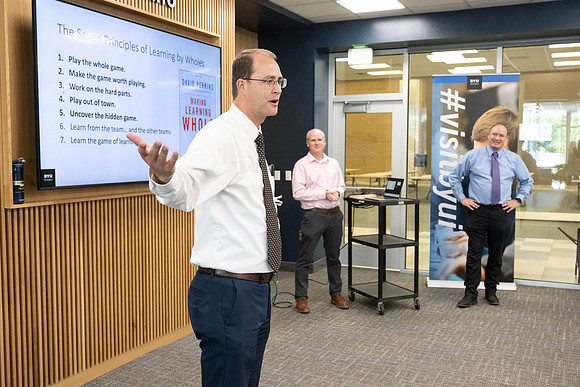 Faculty gather together for a Conference before the start of the Fall semester.
