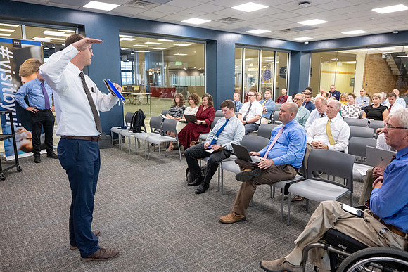 Faculty gather together for a Conference before the start of the Fall semester.
