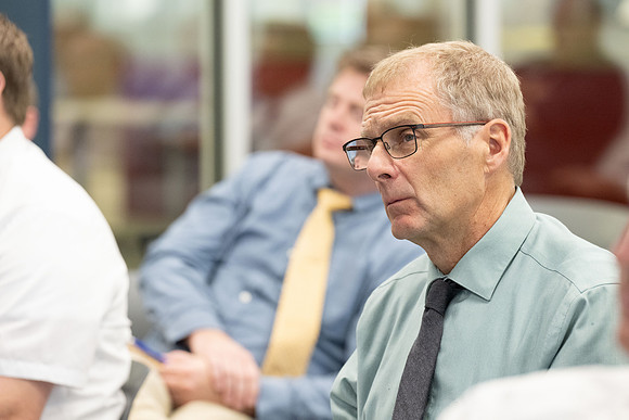 Faculty gather together for a Conference before the start of the Fall semester.