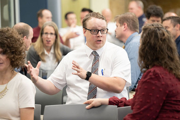 Faculty gather together for a Conference before the start of the Fall semester.