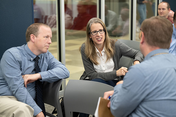 Faculty gather together for a Conference before the start of the Fall semester.