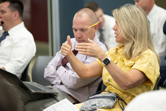 Faculty gather together for a Conference before the start of the Fall semester.