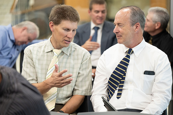 Faculty gather together for a Conference before the start of the Fall semester.