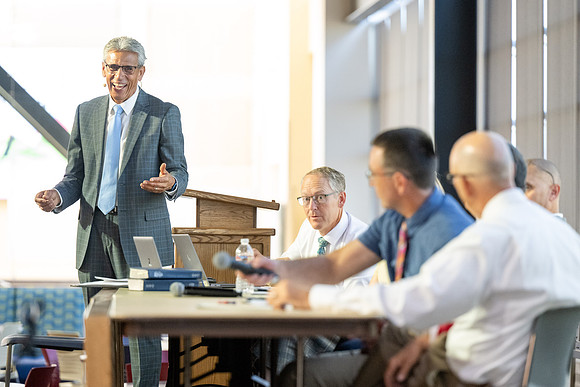 Faculty gather together for a Conference before the start of the Fall semester.