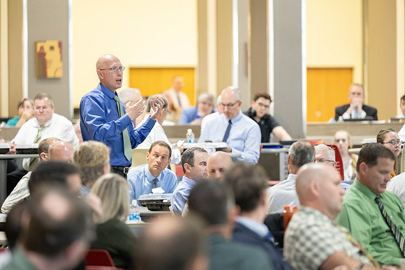 Faculty gather together for a Conference before the start of the Fall semester.