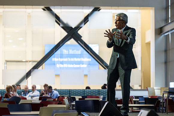 Faculty gather together for a Conference before the start of the Fall semester.